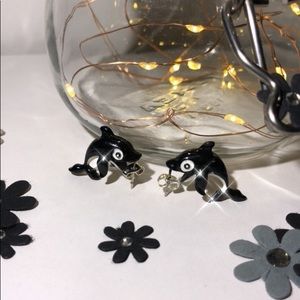 Black and white dolphin earrings